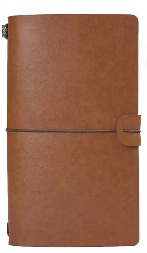 Vintage dagboek met schriften en hoesjes